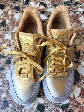 Nike Air Force 1 Metallic Gold and Silver Low Top Sneakers
